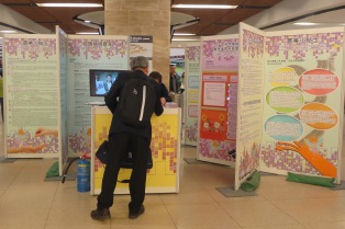 The photo shows visitors viewing exhibition panels at the roving exhibition to gain a better understanding of the Ordinance.